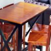 Juego de desayunador y cuatro banquetas